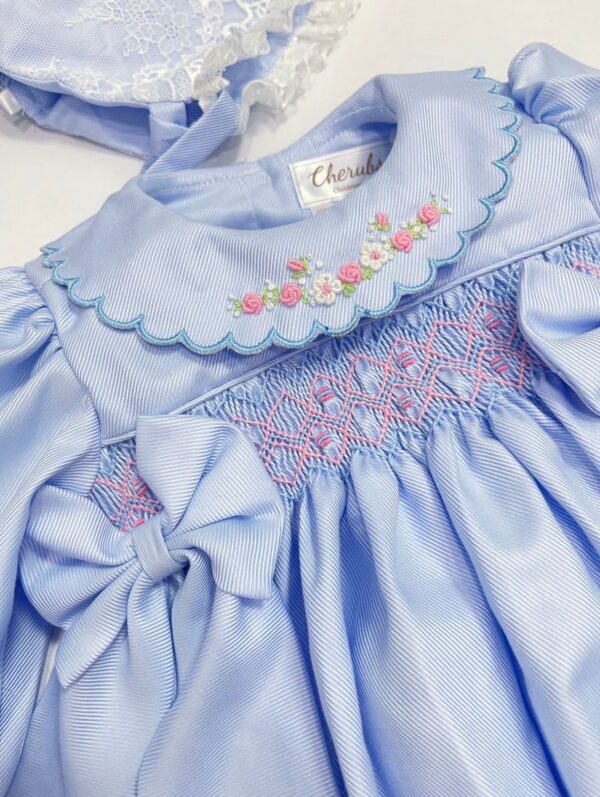 Blue Romper and Lace Bonnet